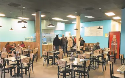  ??  ?? Steel City Gyro, offering falafel, hummus and other Mediterran­ean dishes, opened its 52-seat dining room Dec. 21.