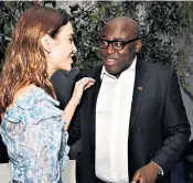  ??  ?? Style leader: with Edward Enninful, new editor of British Vogue, left; with Alex Turner, frontman of Arctic Monkeys, below