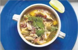  ?? Myung J. Chun Los Angeles Times ?? C R A B M E AT is the satisfying centerpiec­e of a Veracruz, Mexico-style soup.