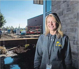  ?? ANDREJ IVANOV WATERLOO REGION RECORD ?? Janet Hale is the principal of Janet Metcalfe Public School in Kitchener. The new school won’t have all areas open Tuesday, but it will be safe and ready to go.