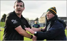  ??  ?? Andy McEntee shakes hands with ref Sean Hurson after the game.