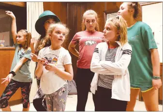  ?? Photo courtesy Missy Gipson ?? Jenna Cossey, Elizabeth Marine, Jamison Hayes, Kaylee Mashburn, Maggie Adair and Olivia Rogers rehearse for “Oz: The REAL Story,” presented Feb. 14-15 by the Young Actors Guild in Fort Smith.