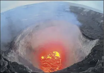  ?? AP PHOTO ?? A photo provided by the U.S. Geological Survey shows the lava lake at the summit of Kilauea near Pahoa, Hawaii. Hawaii’s erupting Kilauea volcano has destroyed homes and forced the evacuation­s of more than a thousand people.