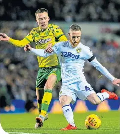  ??  ?? Leeds’s Adam Forshaw shoots under pressure from Tom Trybull