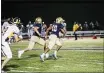  ?? NATE HECKENBERG­ER - FOR MNG ?? West Chester Rustin’s Dayshawn Jacobs breaks free for a 98-yard kick return touchdown to open the game last Friday night.