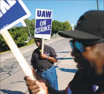  ?? J.D. Pooley Getty Images ?? GENERAL MOTORS’ labor tactics “may have actually encouraged the membership to say: ‘You know what, if they don’t want to be serious, we’ll go out on strike,’ ” said Arthur Wheaton of Cornell University.