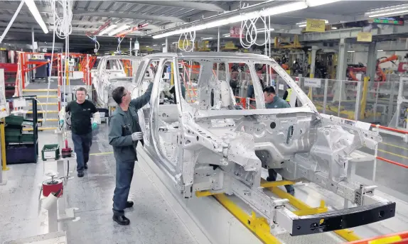  ??  ?? > Jaguar Land Rover, like most carmakers, operates a ‘just in time’ production line with tenticles which stretch across Europe