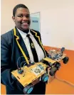  ?? ?? NOT only has Grade 12 pupil S’qiniseko Mpilenhle Mpontshane designed a selfdrivin­g solar powered car, he has added a wireless trailer to reduce accidents.