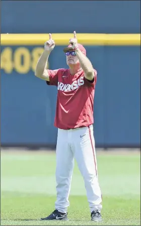  ?? Charlie Kaijo/NWA Democrat-Gazette ?? Practice: Arkansas head coach Dave Van Horn gestures last month during a practice before the start of the NCAA College World Series at Charles Schwab Field in Omaha, Neb. Arkansas’ roster could be greatly impacted by the Major League Baseball draft.