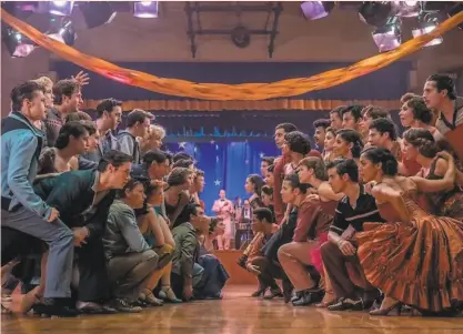  ?? Niko Tavernise / 20th Century Fox ?? Rival gangs, the Sharks and the Jets, prepare to rumble in Steven Spielberg’s “West Side Story,” a film due later this year with screenplay by Tony Kushner and choreograp­hy by Justin Peck.