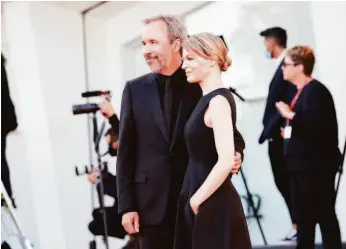 ?? Vittorio Zunino Celotto / Getty Images ?? Director Denis Villeneuve, pictured with Tanya Lapointe on Sept. 1 at the Venice Internatio­nal Film Festival, will attend the Mill Valley Film Festival.