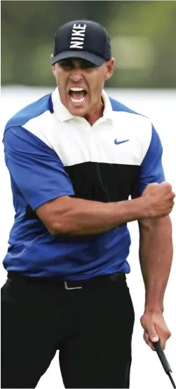  ?? CHARLES KRUPA/AP ?? Brooks Koepka is the first man to hold back-to-back titles in two majors (PGA Championsh­ip and U.S. Open) at the same time.