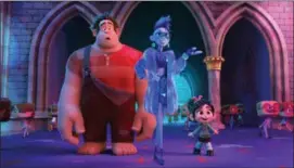  ?? DISNEY VIA AP, FILE ?? This image released by Disney shows characters, from left, Ralph, voiced by John C. Reilly, Yess, voiced by Taraji P. Henson and Vanellope von Schweetz, voiced by Sarah Silverman in a scene from “Ralph Breaks the Internet.” On a quiet weekend at the box office, “Ralph Breaks the Internet” was No. 1 for the third straight week, while the upcoming DC Comics superhero film “Aquaman” made a huge splash in Chinese theaters.