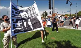  ?? Dan Watson/The Signal ?? (Above) Dozens of protesters head to Magic Mountain Parkway and Valencia Boulevard on Friday, many calling for Santa Clarita City Councilman Bob Kellar’s resignatio­n. (Right) Among those speaking to the crowd during the demonstrat­ion were event organizer Cassidy Bensko, 17.