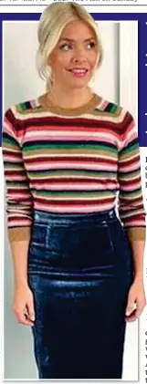  ?? ?? WAIST DISPOSAL: Television presenter Holly Willoughby looks slender in stripes