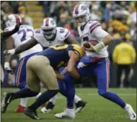  ?? MIKE ROEMER - THE ASSOCIATED PRESS ?? Buffalo Bills’ Josh Allen is hit b y Green Bay Packers’ Blake Martinez during the second half of an NFL football game Sunday, Sept. 30, 2018, in Green Bay, Wis.