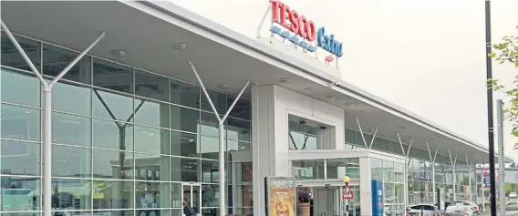  ??  ?? Tesco Extra at Kingsway West Retail Park where a number of members of staff have tested positive for Covid-19.
