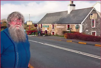  ??  ?? Michael O’neill outside The Railway Tavern in Camp: “The pub has been here through two World Wars and a few recessions. Things will get better and we’re not going anywhere.”