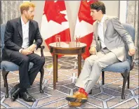  ?? CHRIS YOUNG/THE CANADIAN PRESS ?? Prince Harry, left, meets with Canadian Prime Minister Justin Trudeau in Toronto on Saturday.