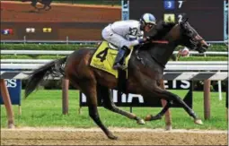  ?? CHELSEA DURAND/NYRA ?? Moonlit Garden with Jose Ortiz aboard races to the wire to capture Sunday’s $100,000 Summer Colony at Saratoga Race Course.