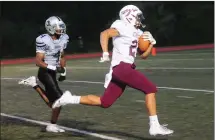  ?? Ernest A. Brown photo ?? The Woonsocket High School community is rallying around senior Emmanuel Gomes, seen playing football for the school team last week at Tucker Field. Gomes’ mother, Rena Fleury, died that night after suffering cardiac arrest while watching from the stands.