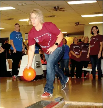 ?? Janelle Jessen/Siloam Sunday ?? Jennifer Welch of Crye-Leike Realty took a turn during the inaugural Bowl for Kids’ Sake Siloam Springs on Thursday afternoon at Community Bowl.