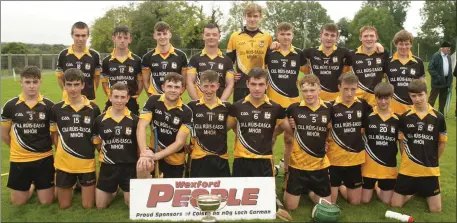  ??  ?? The Askamore crew with the spoils of success after their Wexford People Minor Roinn 2 championsh­ip final victory.