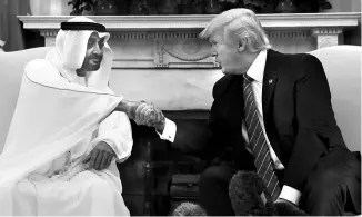  ?? REUTERS ?? President Trump with Crown Prince Mohammed bin Zayed Al-Nahyan, the effective ruler of the United Arab Emirates. The Emirates is a top exporter of aluminum to the United States