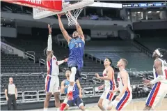  ?? USA TODAY SPORTS ?? Milwaukee forward Giannis Antetokoun­mpo, No.34, shoots against the Pistons at Bradley Center in Milwaukee.