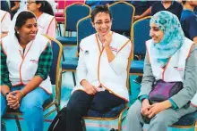  ??  ?? Rana Fanek (centre) with her colleagues during the Aster DM Healthcare virtual gathering on December 3.