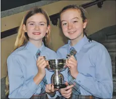  ?? 17_MOD42DM03_Tuesday ?? Caitlyn Yule and Johanna MacIver McLeod from Àrd-sgoil Greenfauld­s received the Donald Ross Memorial Trophy for winning the fluent duets singing for under-13s.