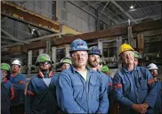  ?? LUKE SHARRETT / THE NEW YORK TIMES ?? Workers attend an event at Century Aluminum, which backed the Trump tariffs on steel and aluminum that may spur higher prices on items.