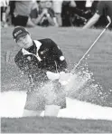  ??  ?? Ariya Jutanugarn hits out of the sand on the 18th hole during a playoff.