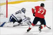  ?? JOEL AUERBACH / GETTY IMAGES ?? Nick Bjugstad beats Toronto goalie Frederik Andersen for the shootout winner Wednesday night. Bjugstad also scored during regulation.