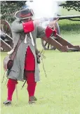  ??  ?? At the Battle of the Boyne site, visitors can see cavalry combat in full gallop ... and get a bang out of the musket demo.