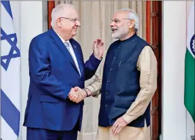  ?? REUTERS ?? Prime Minister Narendra Modi shakes hands with Israeli President Reuven Rivlin ahead of their meeting at Hyderabad House in New Delhi, on 15 November 2016.