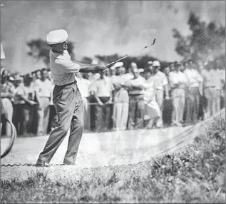  ?? Julian C. Wilson Associated Press ?? HOGAN TAKES A SWING during a practice round for the 1953 U.S. Open at Oakmont, Pa. Hogan went on to win by six shots, one of six major titles he captured after his accident in 1949.