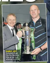  ??  ?? EARLY JOY Schmidt lifted the Six Nations title at his first attempt in 2014