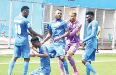  ??  ?? Enyimba players celebratin­g a goal in a recent game