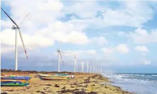  ?? ?? (Above) The Puttalam wind farm, (below) paddy farming contribute­s to high GHG levels (Pix by Jayarathna Wikramaara­chchi and Hiran Priyankara Jayasinghe)