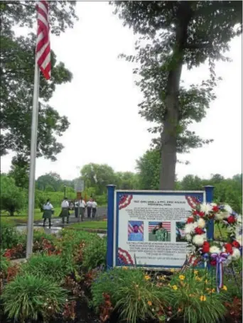  ?? SULAIMAN ABDUR-RAHMAN — THE TRENTONIAN ?? Hamilton Township remembers the military service of fallen hometown heroes Eric Snell, Eric Wilkus, Keith Buzinski and Omar Vazquez during a ceremony at the newly rededicate­d Snell and Wilkus Memorial Park on Saturday, June 17, 2017.