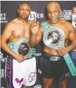  ?? JOE SCARNICI/ VIA USA TODAY SPORTS ?? Roy Jones Jr., left, and Mike Tyson fought to an eight-round draw Saturday in Los Angeles.