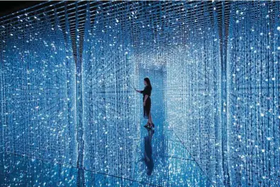  ??  ?? Crystal Universe, an installati­on by Inoko, is one of the highlights of teamLab’s ongoing show in Shenzhen, China.
— ANN