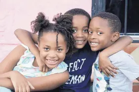  ??  ?? The Lightsey kids, from left, Jazmine, 7, Elliott, 5, and Ethan, 4. All three have developmen­tal disabiliti­es under the autism spectrum.