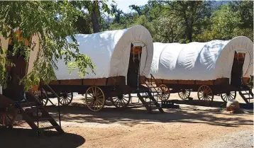  ?? Photo Courtesy Yosemite Pines Resort ?? ■ Yosemite Pines Resort in Groveland, California, 22 miles from the western gate of Yosemite National Park, has six Conestoga Wagons that people can glamp in. The wagons are air-conditione­d and roomier than the ones pioneers traveled in.