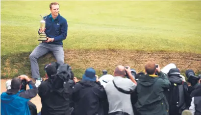  ?? Picture: AFP ?? IN THE LIMELIGHT. After collecting the Claret Jug on Sunday, American Jordan Spieth only needs silverware at the PGA Championsh­ip – the Wanamaker Trophy – to complete a Major career Grand Slam.