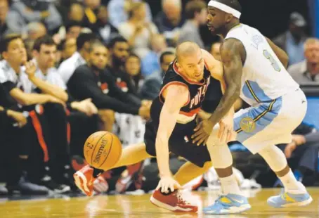  ?? AAron Ontiveroz, The Denver Post ?? Ty Lawson, shown stealing the ball from Steve Blake in Tuesday night’s loss to the Portland Trail Blazers, will have his hands full during Denver’s upcoming road trip that begins Friday night against JohnWall and theWashing­tonWizards.