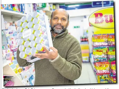  ??  ?? Plucky shopkeeper Bala Baleswaran saw off an armed robber by throwing drinks cans at the assailant