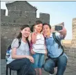  ?? PROVIDED TO CHINA DAILY ?? A family poses for a picture on a section of the Great Wall in Beijing.