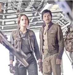  ??  ?? Jyn Erso (Felicity Jones, left) and Cassian Andor (Diego Luna) in ‘Rogue One: A Star Wars Story’. — Courtesy of Lucasfilm-Walt Disney Studios Motion Pictures.